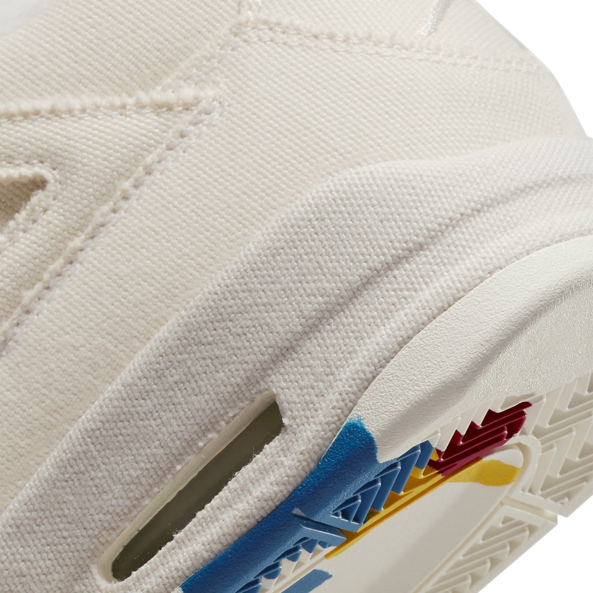 Logo view of Air Jordan 4 Retro Blank Canvas (W) DQ4909-100